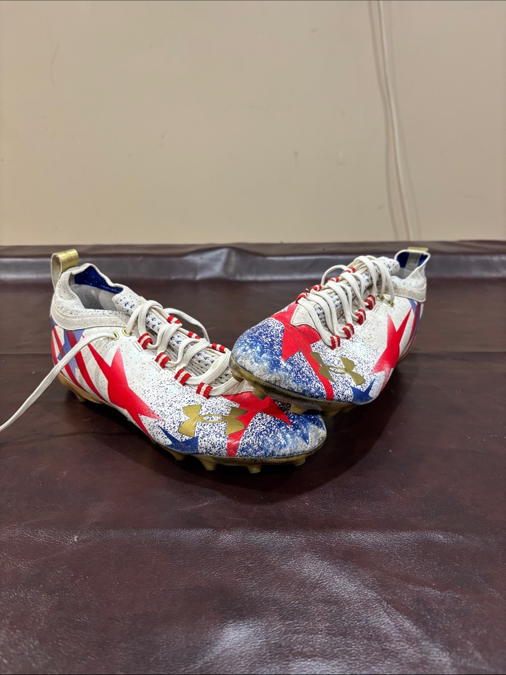Under Armour men Red, White & Blue Star Football Cleats